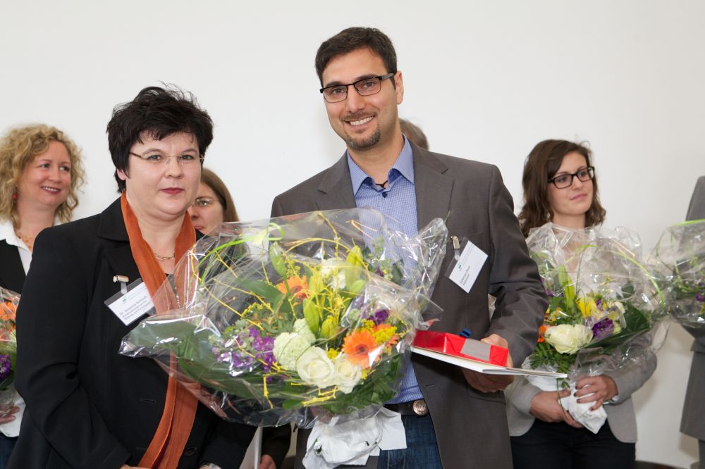 Foto: Gökhan Öcel und Dr. Susanna Schmidt, Leiterin der Abteilung Strategien und Grundsatzfragen im BMBF